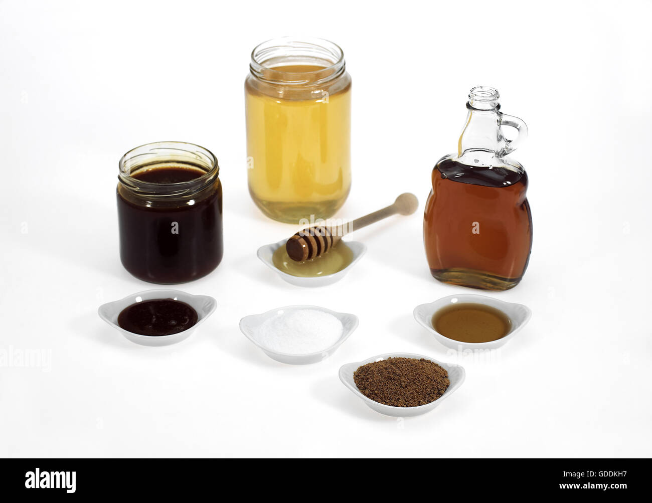Ammenda di zucchero semolato, lo zucchero di canna e sciroppo di acero, sciroppo di melassa e miele Foto Stock