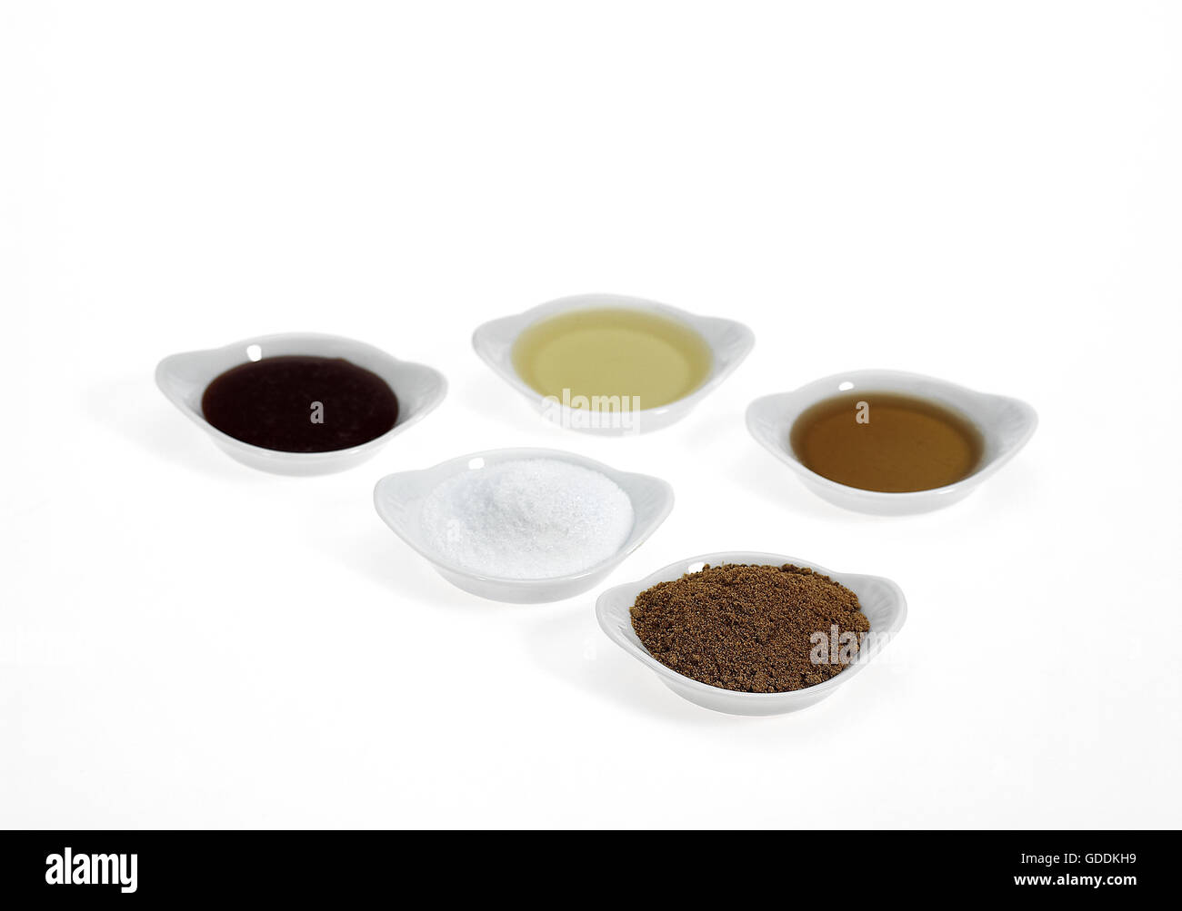 Ammenda di zucchero semolato, lo zucchero di canna e sciroppo di acero, sciroppo di melassa e miele Foto Stock