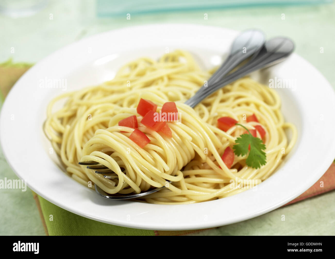 Spaghetti con pomodoro e prezzemolo Foto Stock