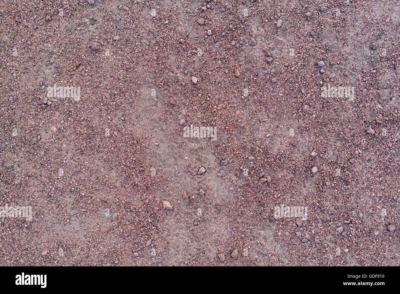 Rosso porpora di granito texture di ghiaia Foto Stock