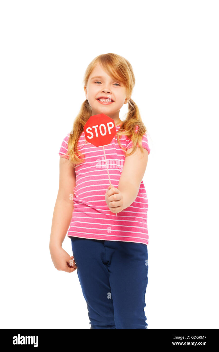 La scolaretta sorridente con piccole'icona Stop Foto Stock