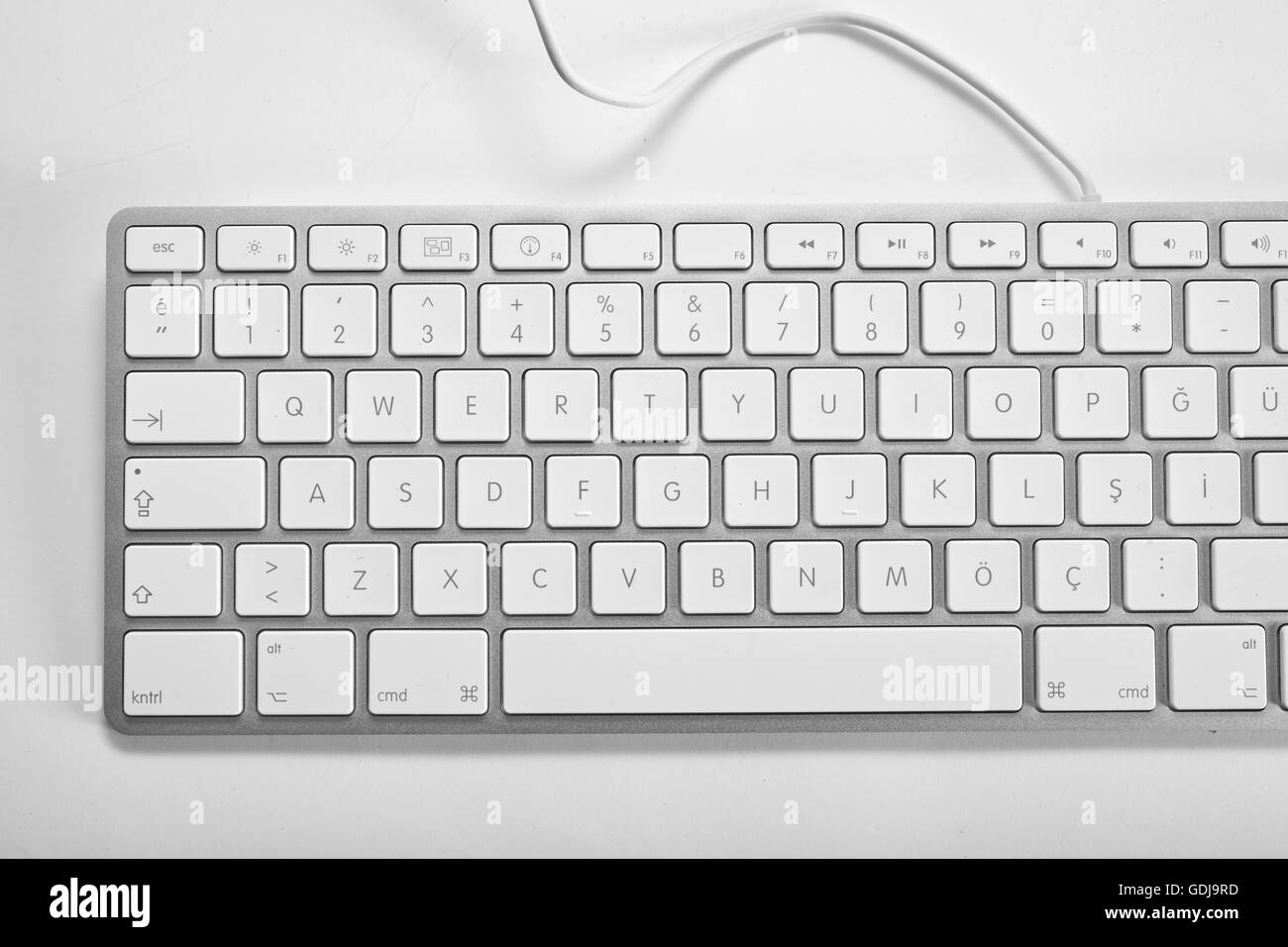 Calcolatore bianco tastiera su uno sfondo bianco Foto Stock