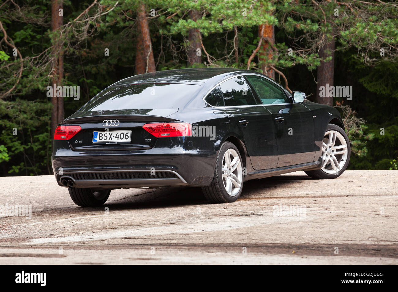 Kotka, in Finlandia - Luglio 16, 2016: Nero Facelift Audi A5 2.0 TDI 2012 anno modello Facelift auto, closeup vista posteriore Foto Stock