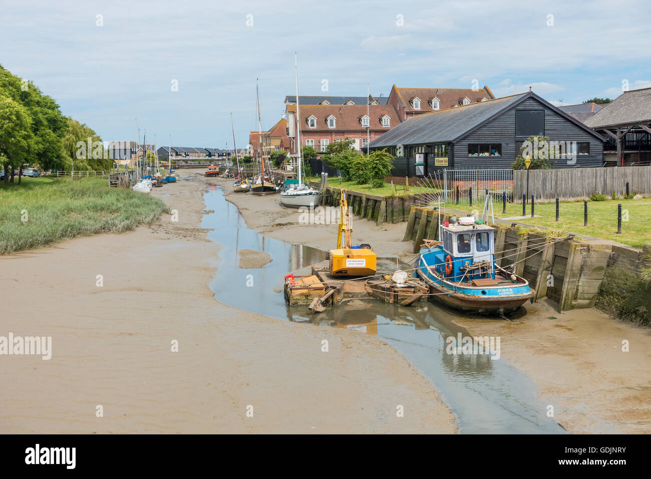 Faversham Creek marea fuori fango banche Faversham Kent REGNO UNITO Foto Stock