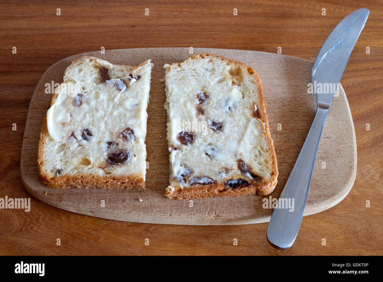 Imburrate il pane di frutta Foto Stock