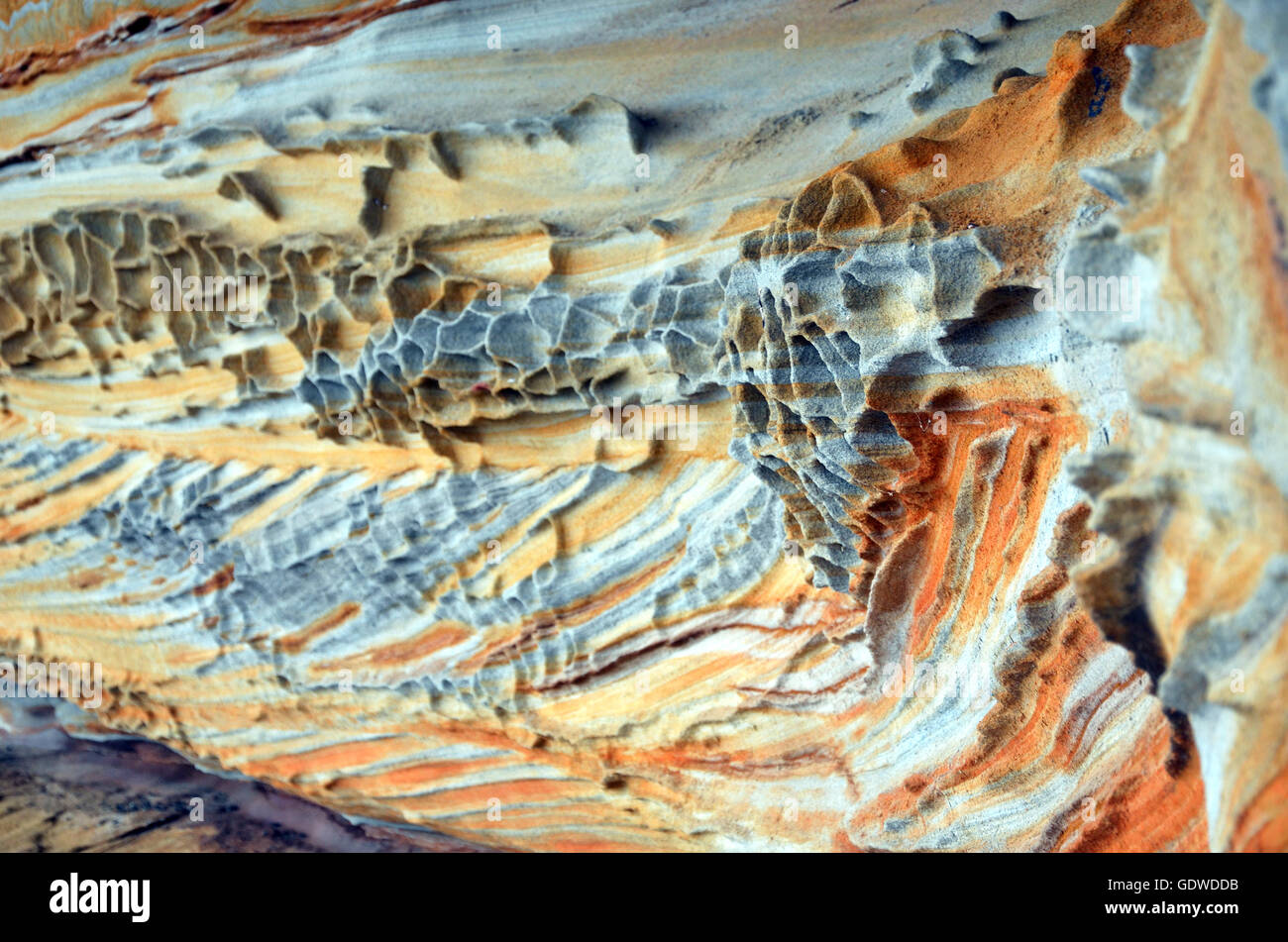 Forme e modelli di weathered Sydney (Hawkesbury) arenaria del New South Wales coast Foto Stock