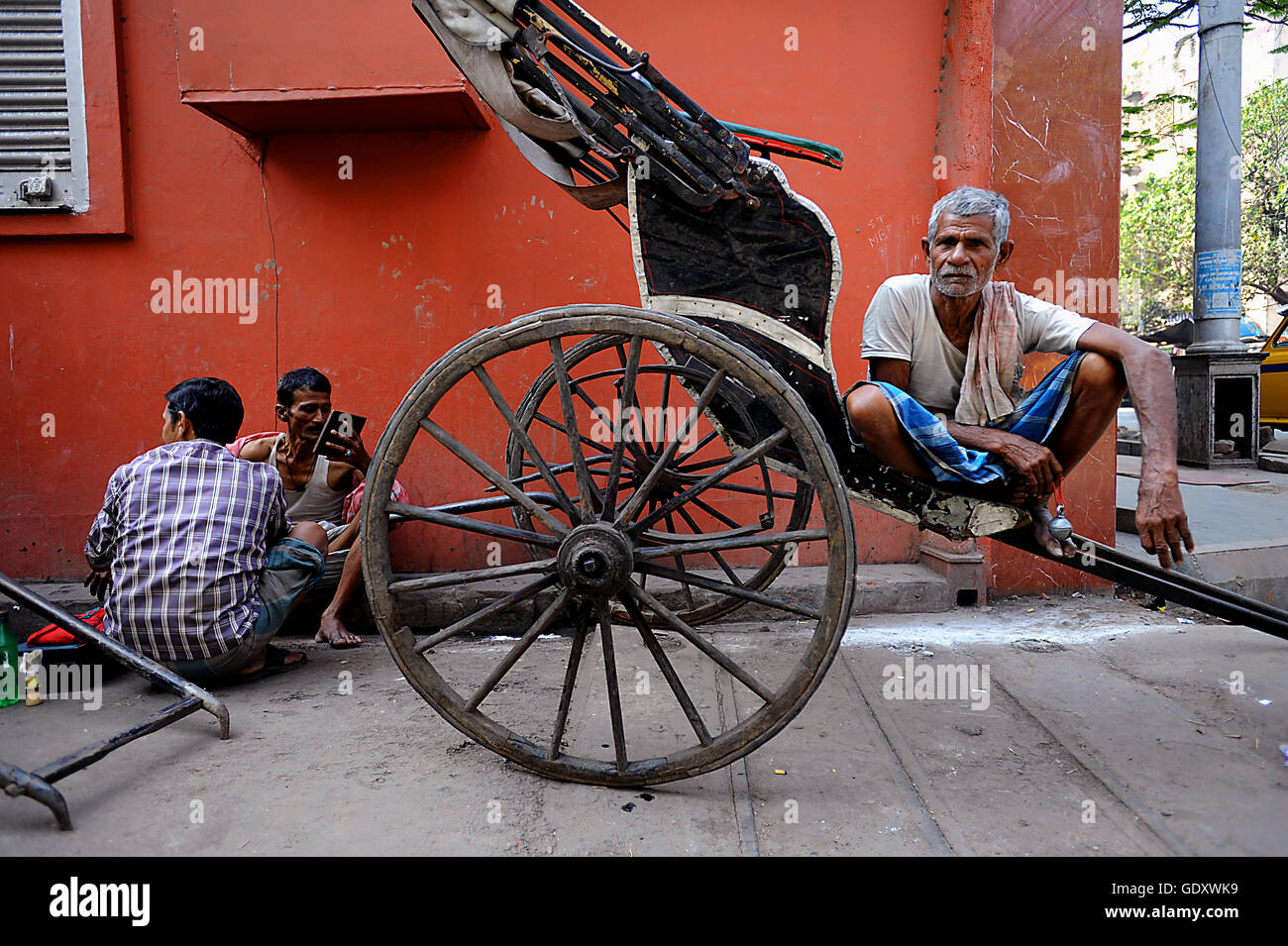 INDIA. Kolkata. 2011. In rickshaw estrattore Foto Stock