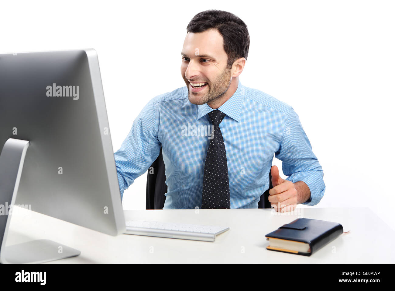 Business uomo al lavoro su un computer Foto Stock