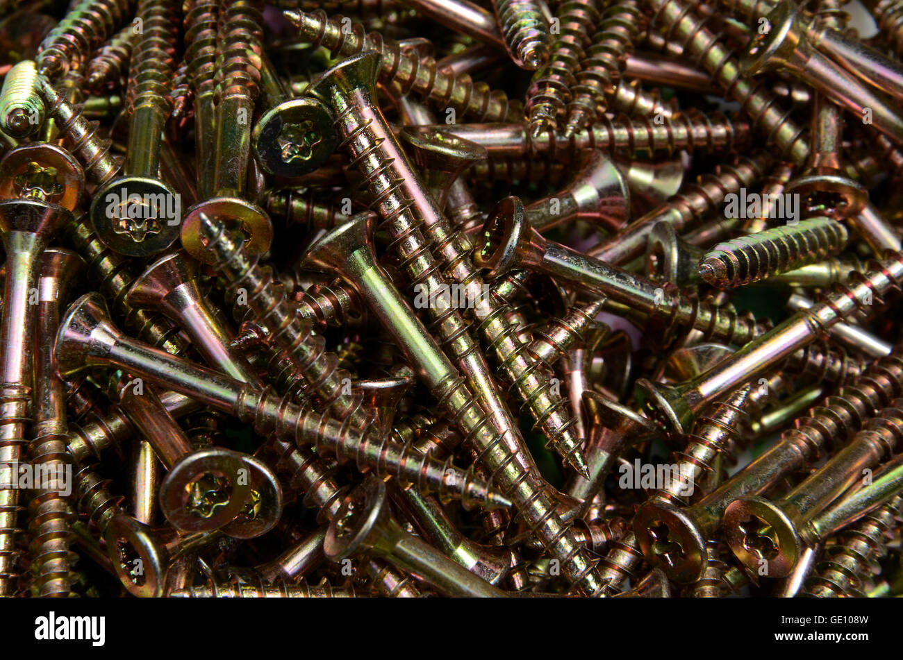 Un intero lotto di nuovo cacciavite Torx viti per legno dello stesso tipo - o se vi è un intruso? Foto Stock