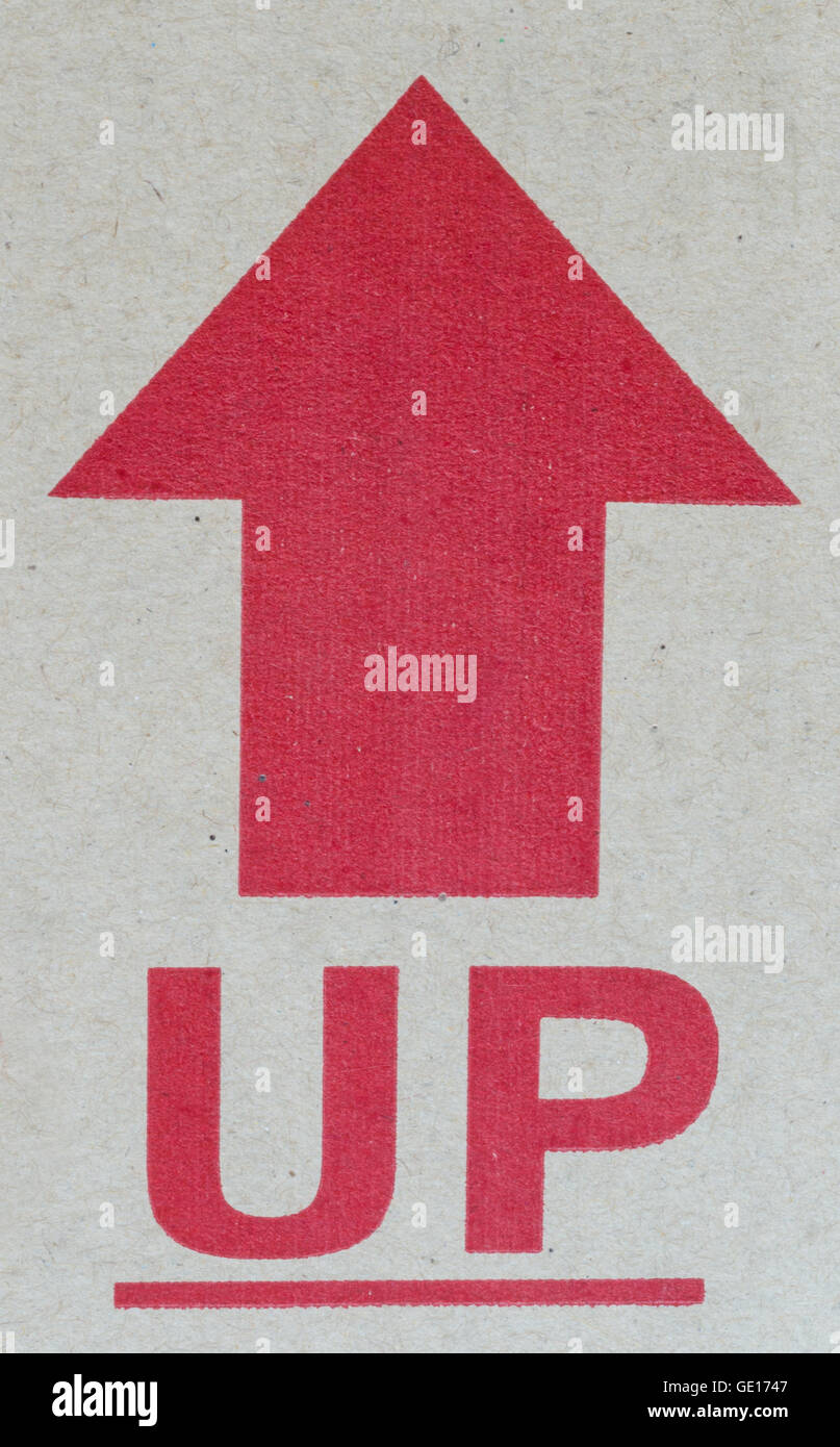 Questo lato in alto segno , sulla scatola. Foto Stock
