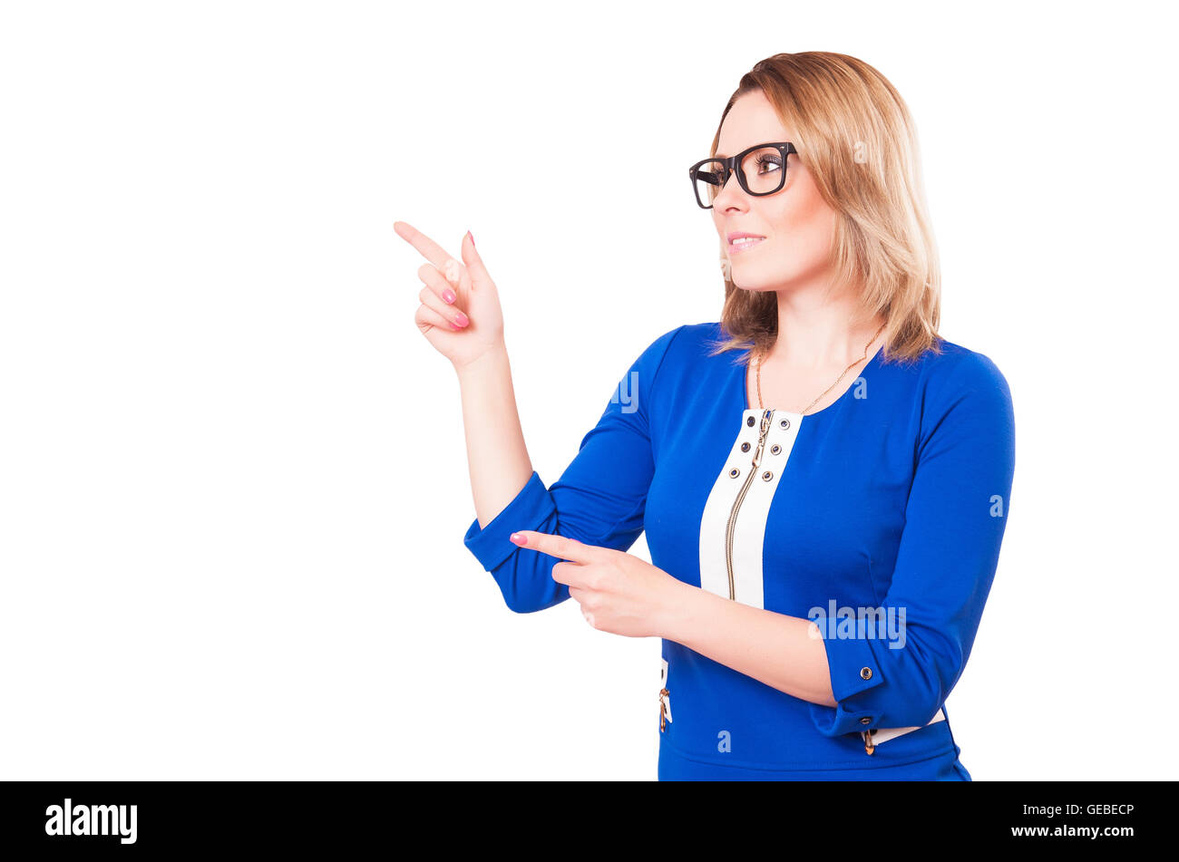 La donna punti un dito. Studio shot. Isolato su sfondo bianco Foto Stock