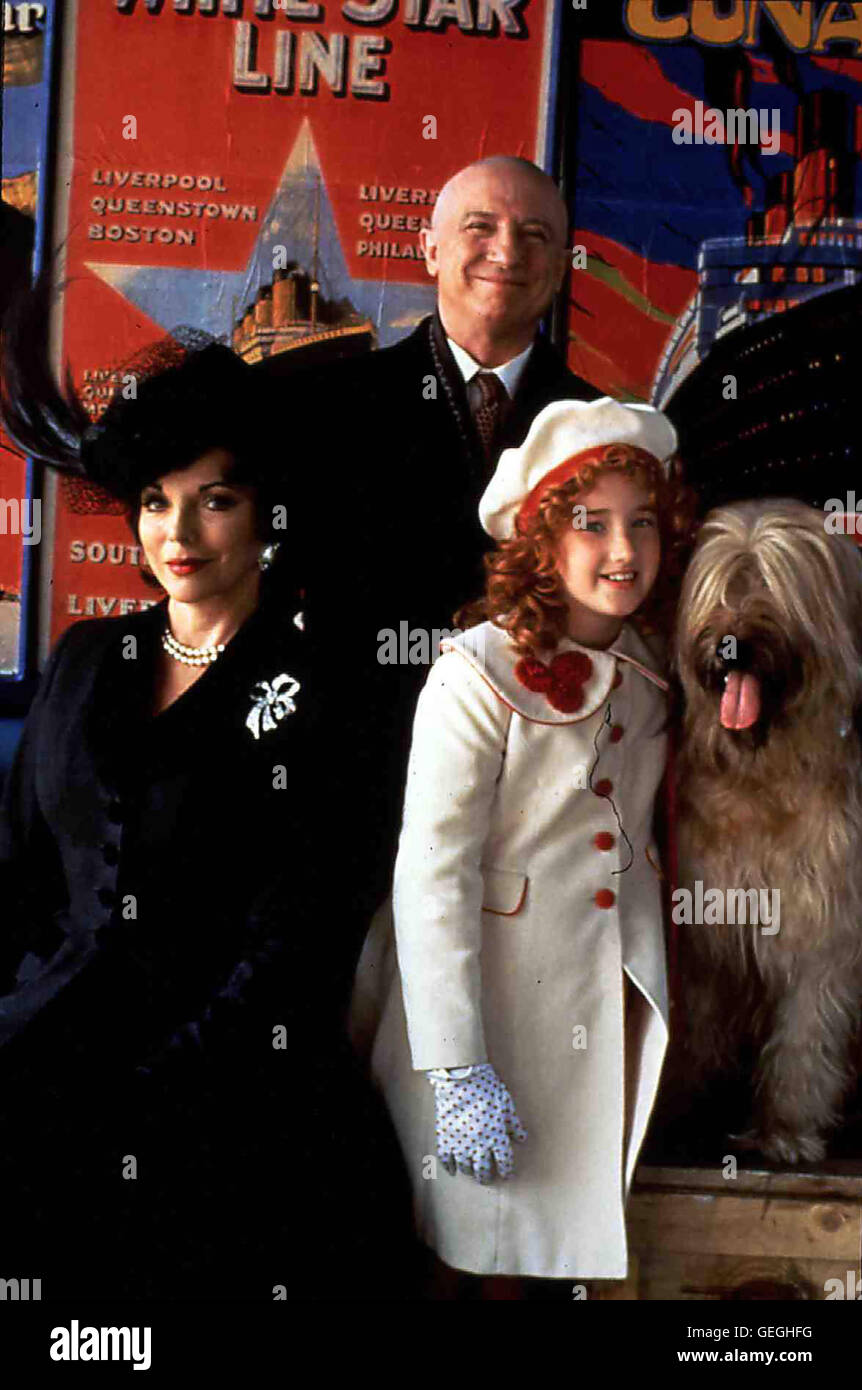 Joan Collins, George Hearn, Ashley Johnson Annie (Ashley Johnsonr) und ihr Vater Warbucks (George Hearn) kommen nach Inghilterra, weil er dort zum Ritter geschlagen werden soll. Warbucks ahnt noch nicht, dass die boesartige Lady Hogbottom (Joan Collins) ihn Foto Stock