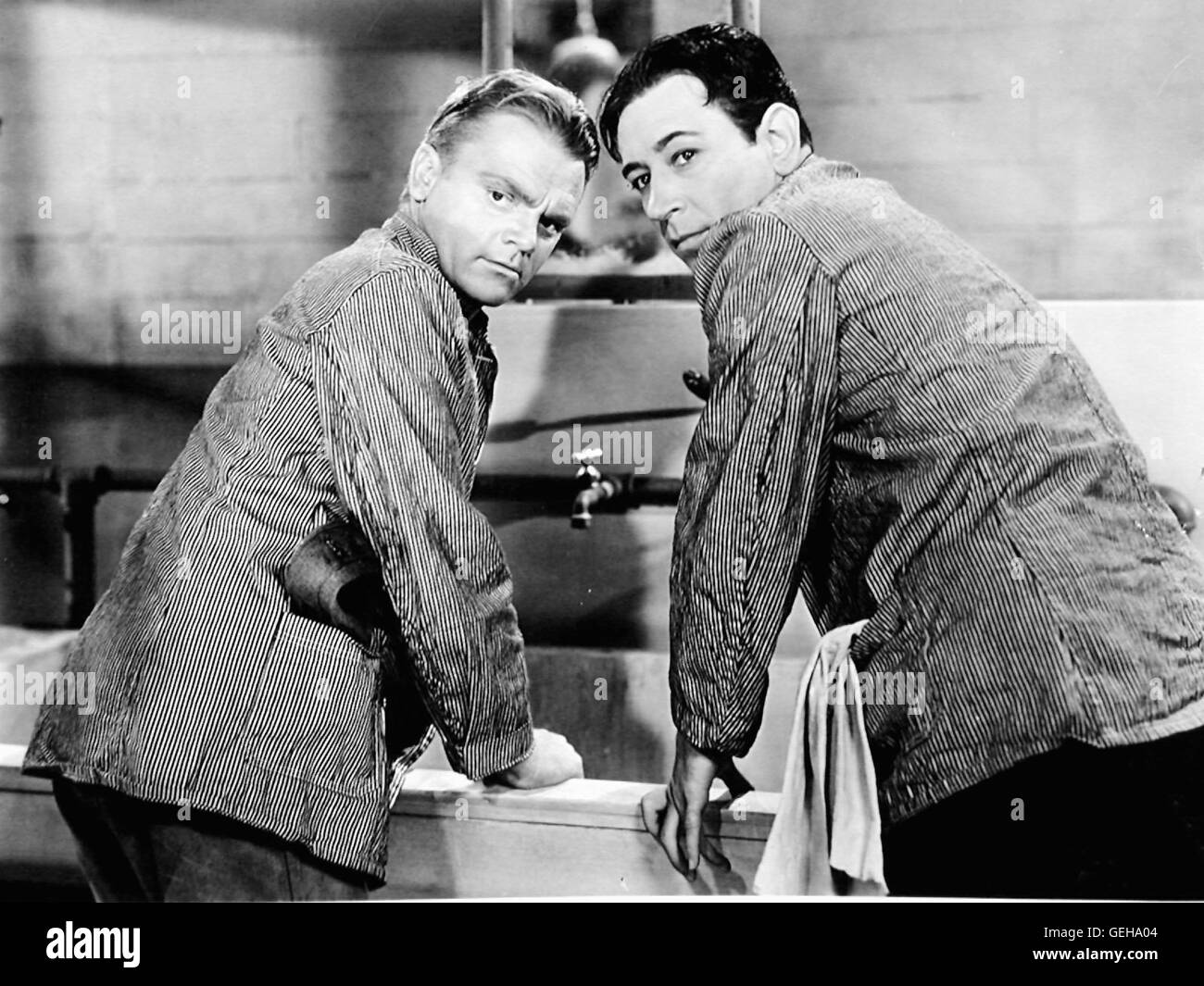 James Cagney, George Raft Nachdem Frank Ross (James Cagney) vergeblich um seine Freilassung gekaempft hat, schliesst er sich einem Mitgefangenen un, dem Gangsterboss cofano Stacey (George Raft). *** Caption locale *** 1939, ogni alba morirò Todesangst Bei Foto Stock