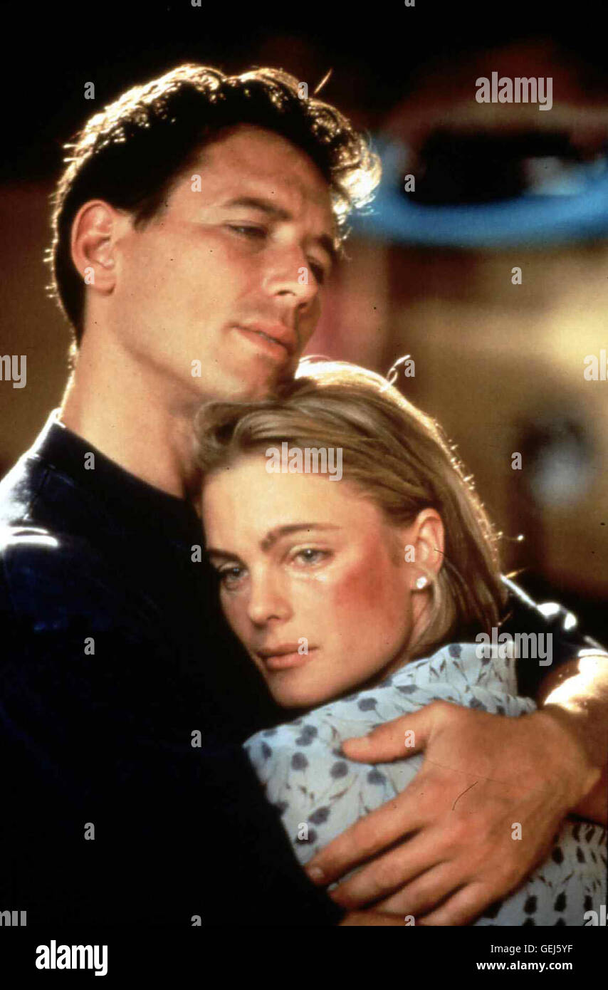 Brian Wimmer, Erika Eleniak nach der Hochzeit beauftragt Kelly (Erika Eleniak) den Anwalt Richard Linski (Brian Wimmer), mit Brooks einen Ehevertrag auszuhandeln, der sehr zu ihrem Vorteil ausfaellt. Als sie von ihrem Mann misshandelt wird, wendet sich Foto Stock