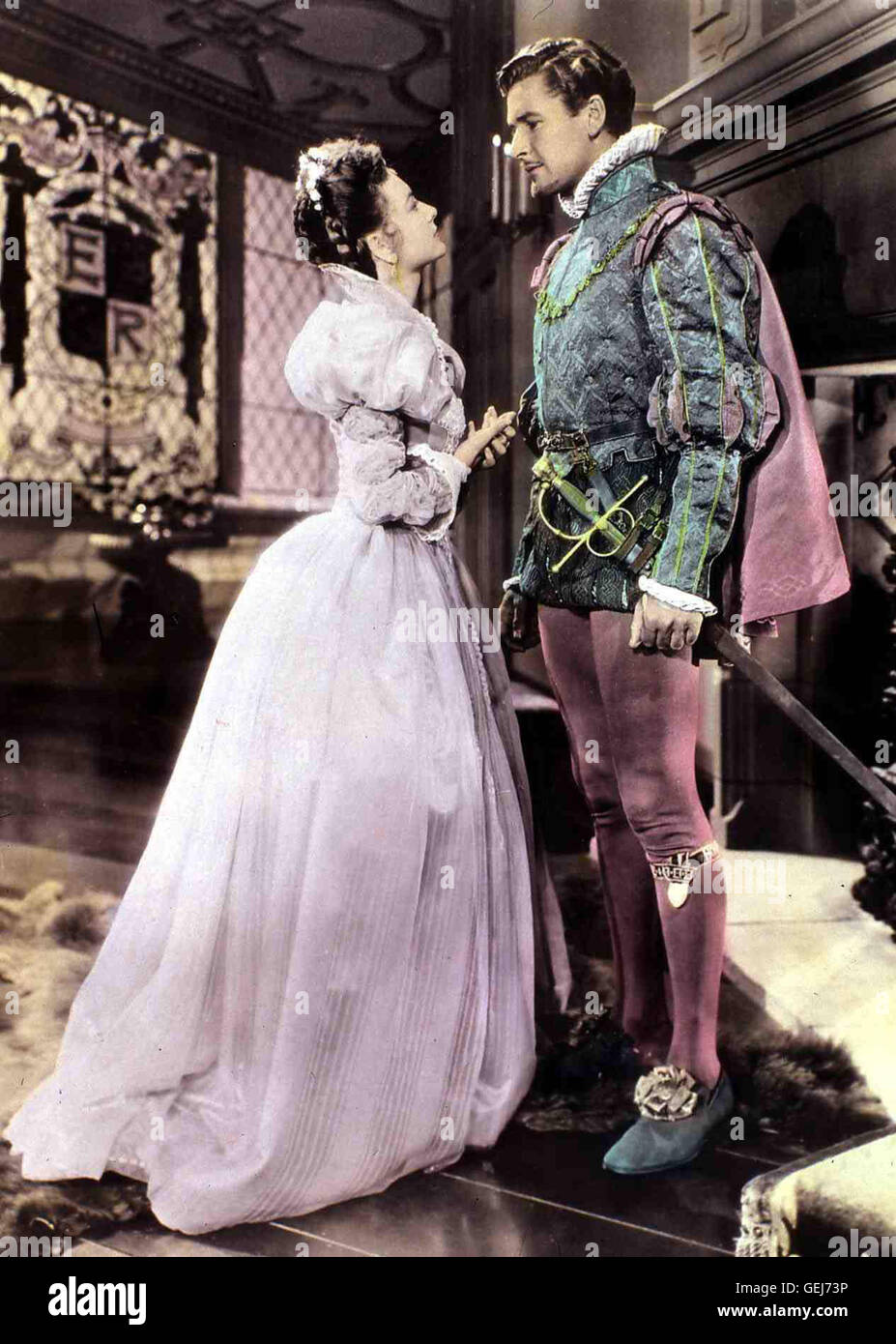 Olivia de Havilland Errol Flynn Der Earl of Essex (Errol Flynn) liebt jedoch Die junge Lady Penelope grigio (Olivia de Havilland). *** Caption locale *** 1939, vita privata di Elizabeth e Essex, Günstling Einer Königin Foto Stock