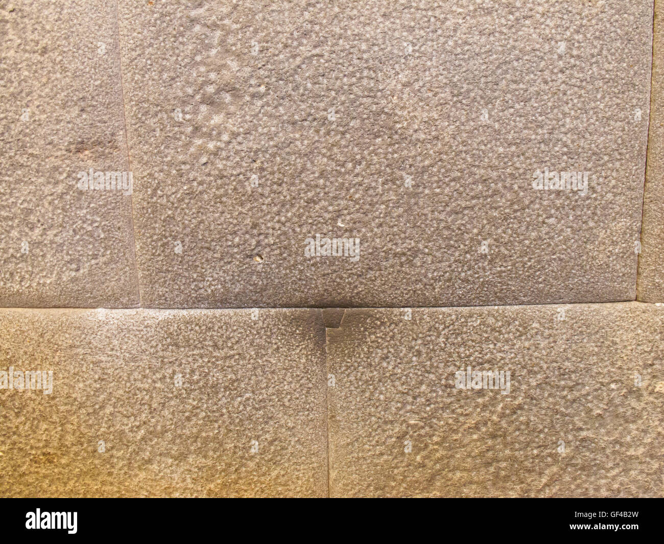 Il buon collegamento di tre enormi blocchi di pietra senza alcuna intercapedine tra presso il Tempio Inca del Sole, Cuzco Foto Stock