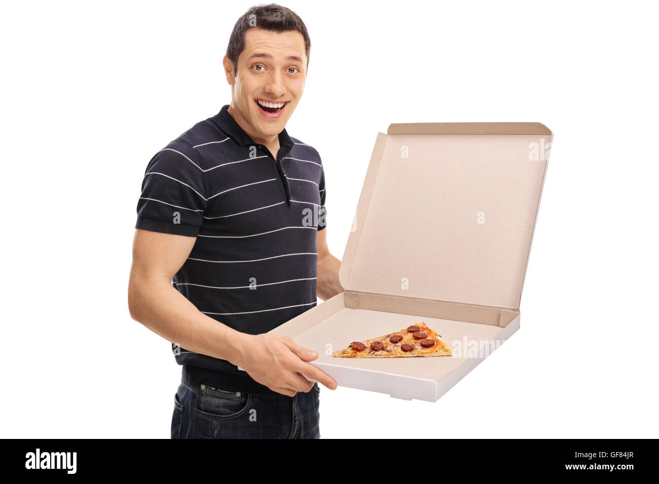 Uomo gioioso tenendo un Scatola pizza con una singola fetta di pizza in essa isolato su sfondo bianco Foto Stock