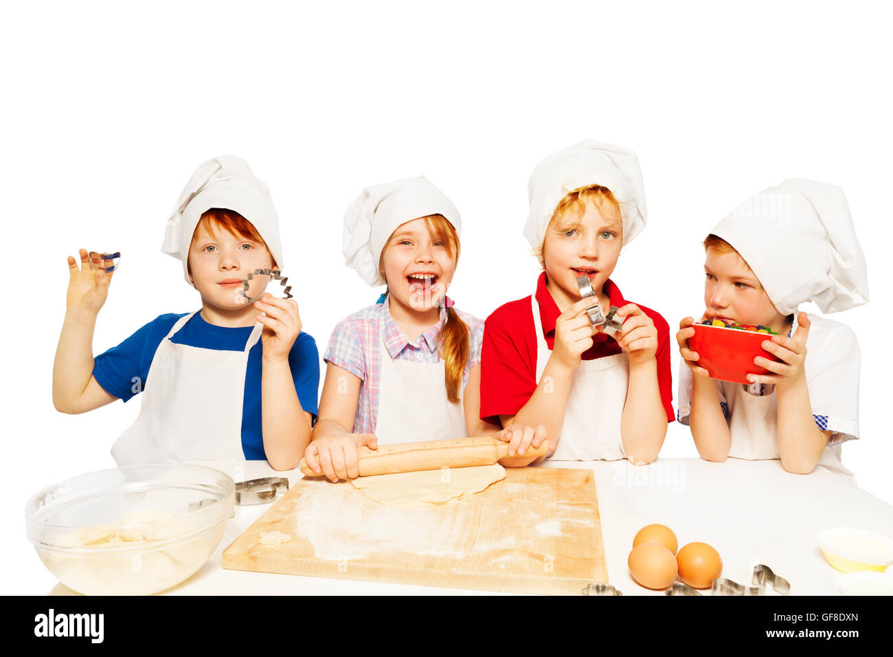 Giovani fornai rendere lâ impasto con cucina-stuff Foto Stock