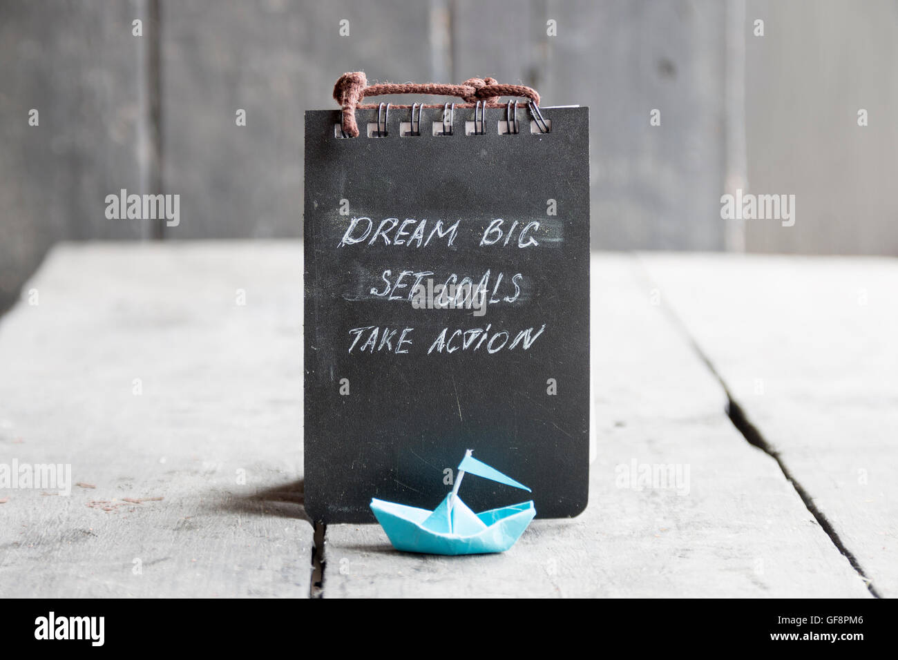 Grande Sogno, impostare obiettivi agire sulla lavagna scritto Foto Stock