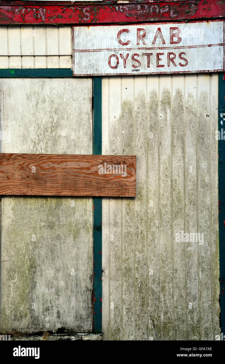 Segno del granchio e ostriche al negozio di porta Foto Stock