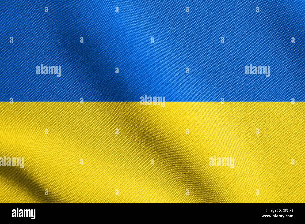 Bandiera dell'Ucraina sventolare nel vento con tessuto dettagliate texture. Ucraina bandiera nazionale. Foto Stock