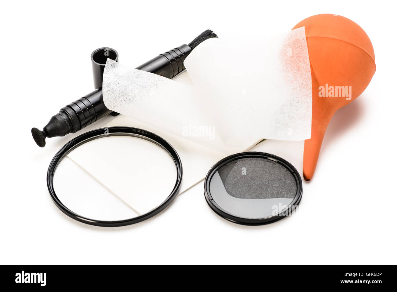 Per la pulizia della lente strumenti su uno sfondo bianco. Foto Stock