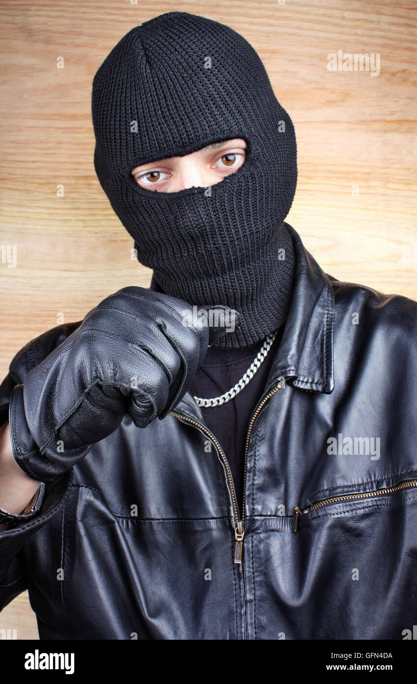 Ladro mascherato in passamontagna bandit gangster Foto stock - Alamy