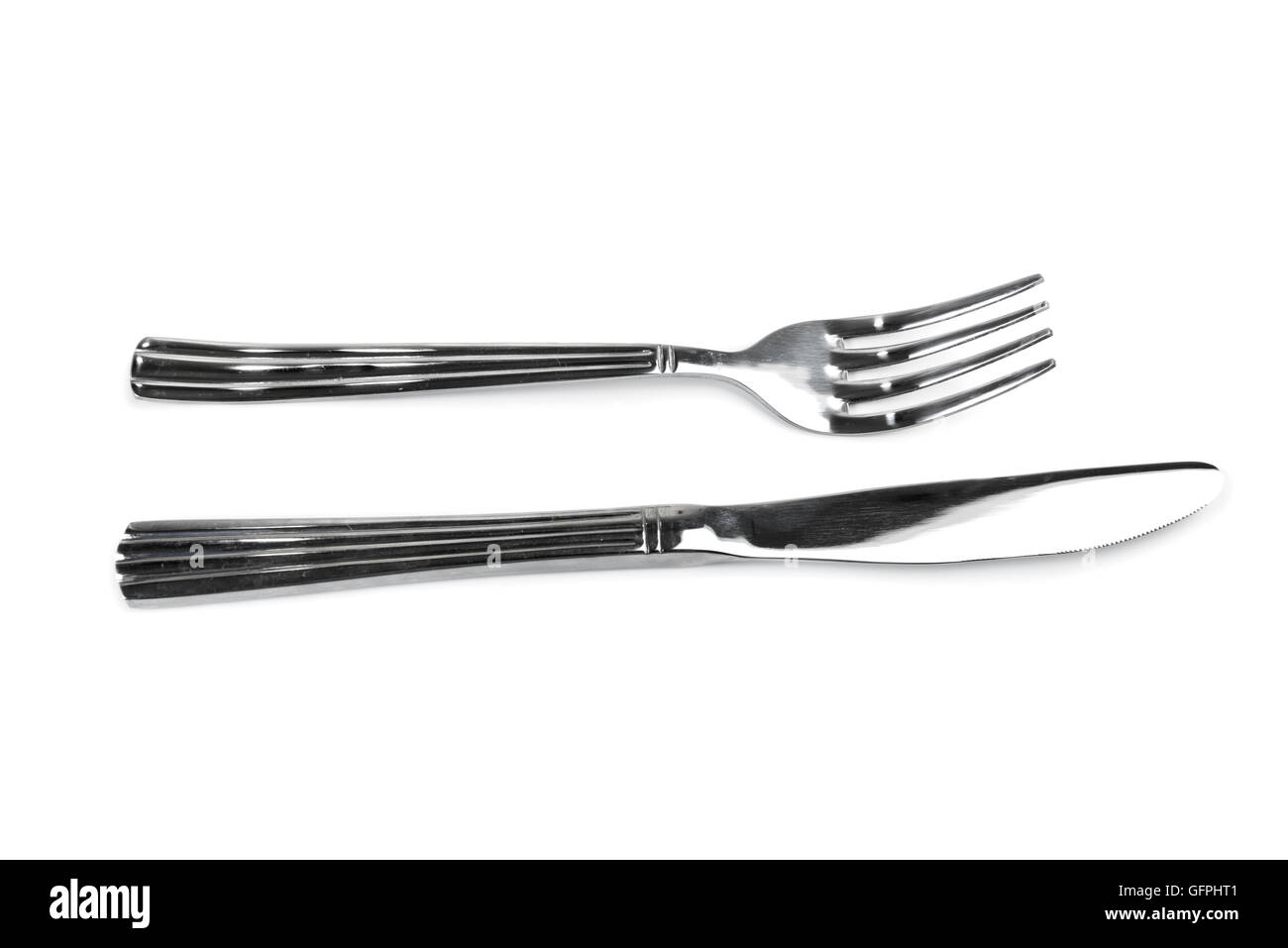Tabella coltello e forchetta isolate su sfondo bianco Foto Stock