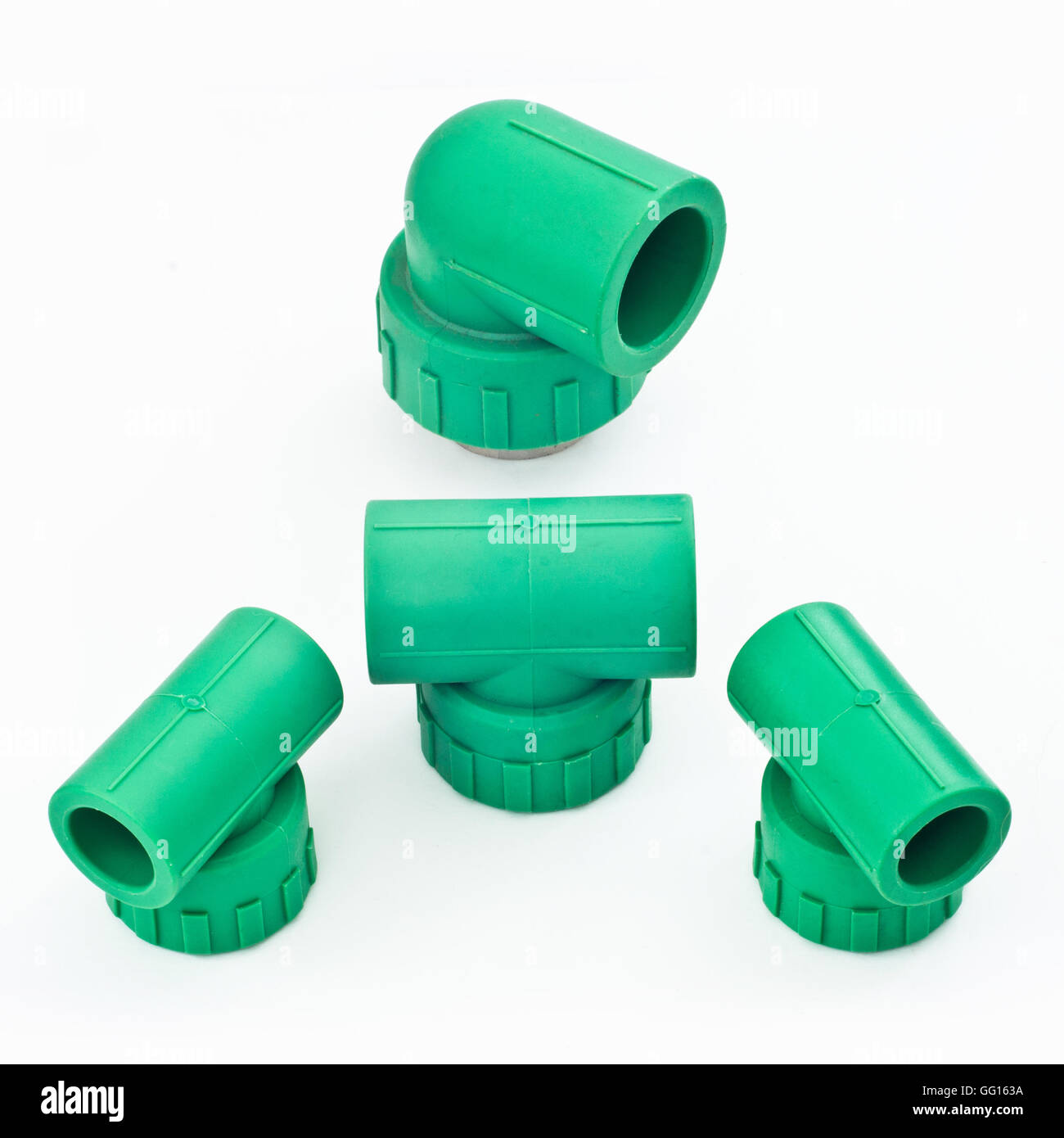 A forma di T e angolo di raccordo su sfondo bianco Foto Stock