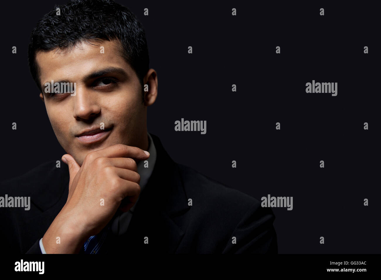 Close-up di bello uomo d affari con sorriso sicuro Foto Stock