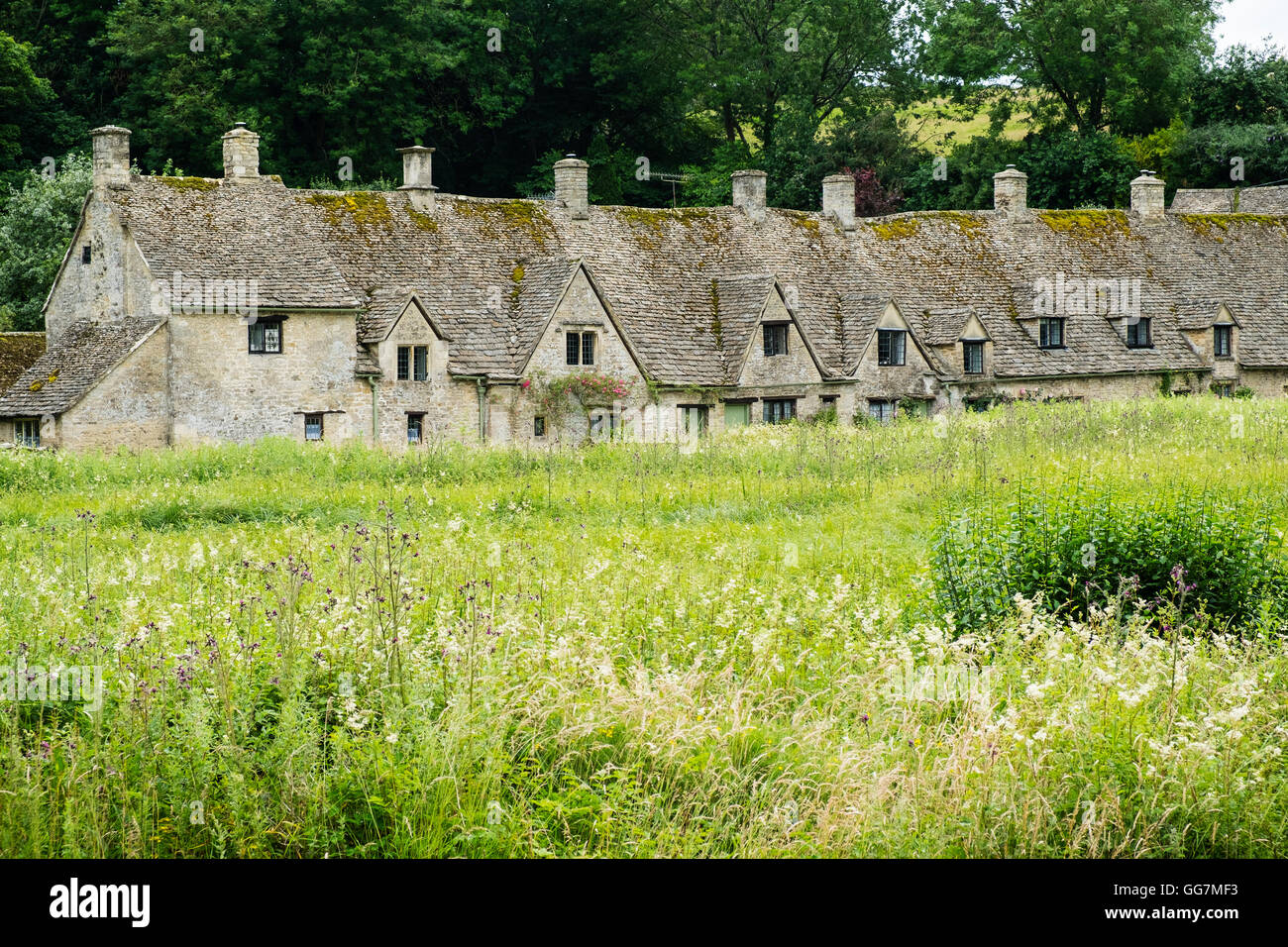 Arlington fila storica ex tessitori cottages in Bibury ,Gloucestershire, Cotswolds ,l'Inghilterra Foto Stock