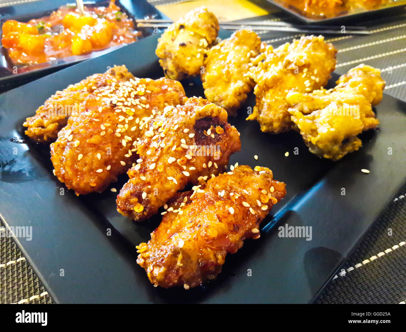 Coreano stile fusion fritte di ali di pollo Foto Stock