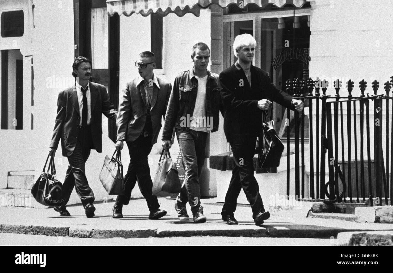 TRAINSPOTTING - NEUE HELDEN / Trainspotting GB 1995 / Danny Boyle Mark Renton hört Iggy Pop und ist wie sein heroinabhängig idolo. Contrassegnare lebt in Edinburgh in einer WG zusammen mit Spud. Tommy, ist zwar auf seine Gesundheit bedacht, verfällt aber trotzdem bald der Droge. Ragazzo malato penibel achtet auf sein Äußeres, neben eroina sind James-Bond-Filme seine eigentliche Sucht... JONNY LEE MILLER - Malati Boy, EWAN McGREGOR - Mark Renton, KEVIN McKIDD - Tommy, Ewen Bremner - Spud Regie: Danny Boyle aka. Trainspotting Foto Stock