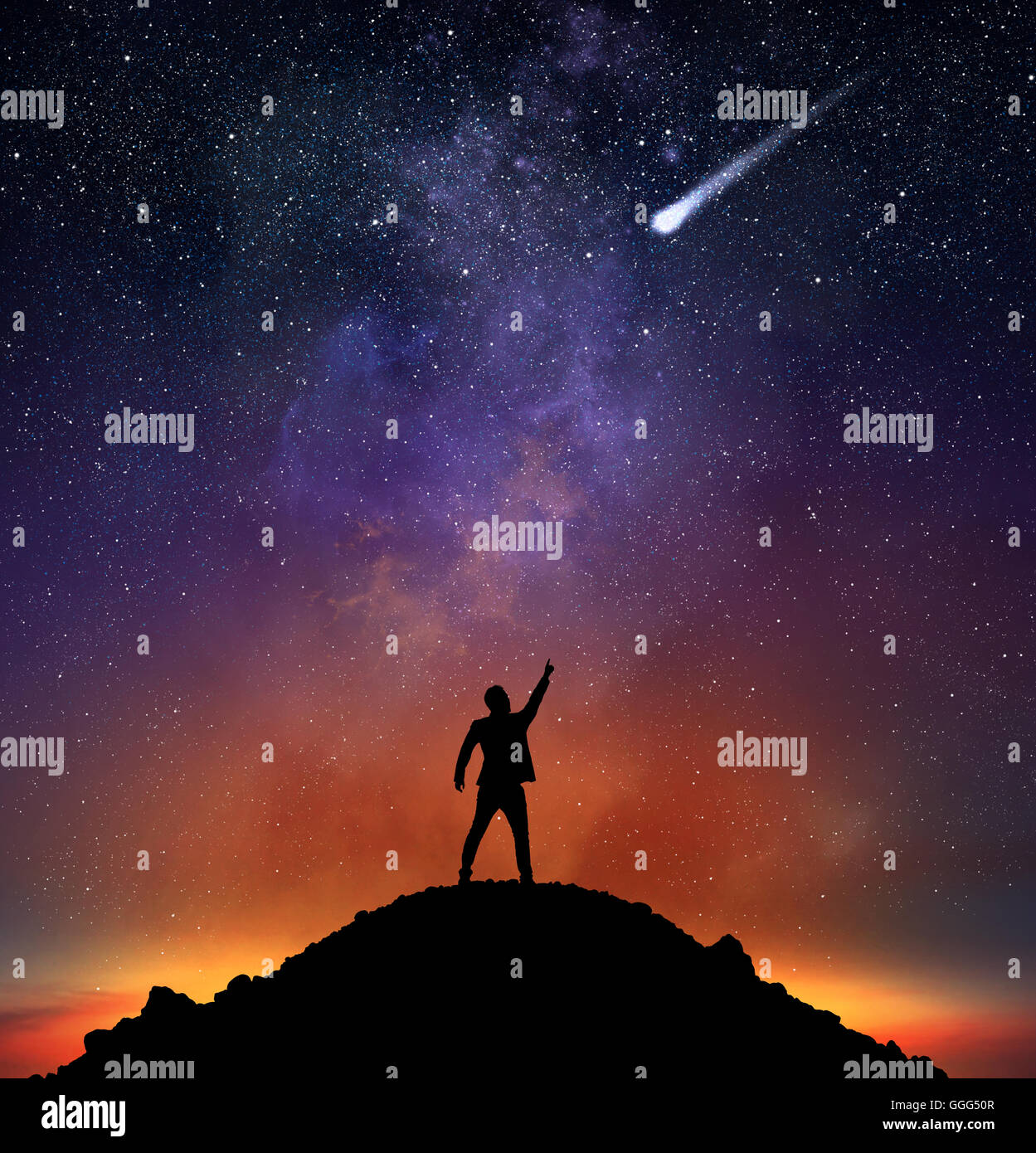 Imprenditore indicano una stella cadente Foto Stock