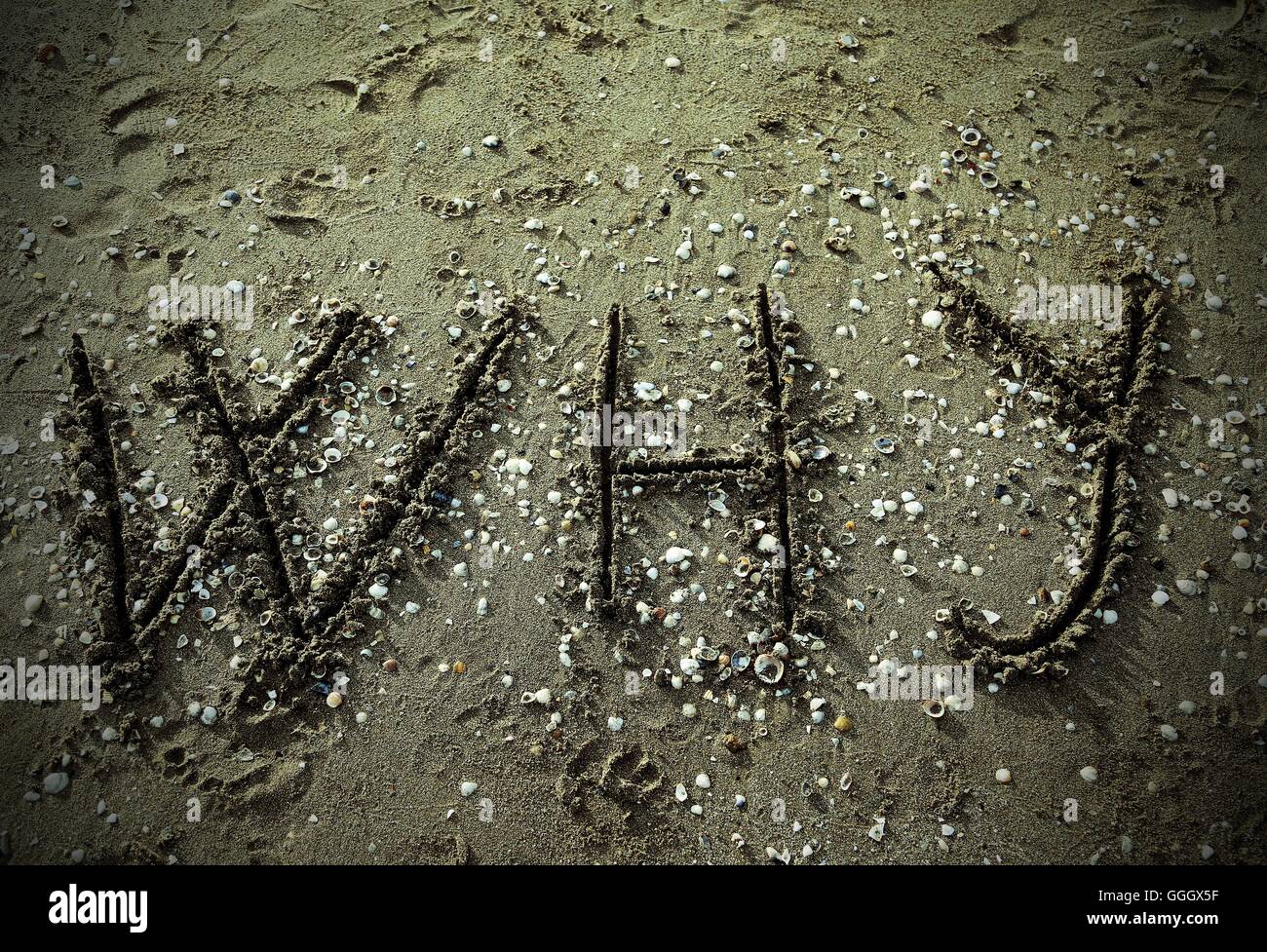 Perché la grande scritta sulla spiaggia Foto Stock