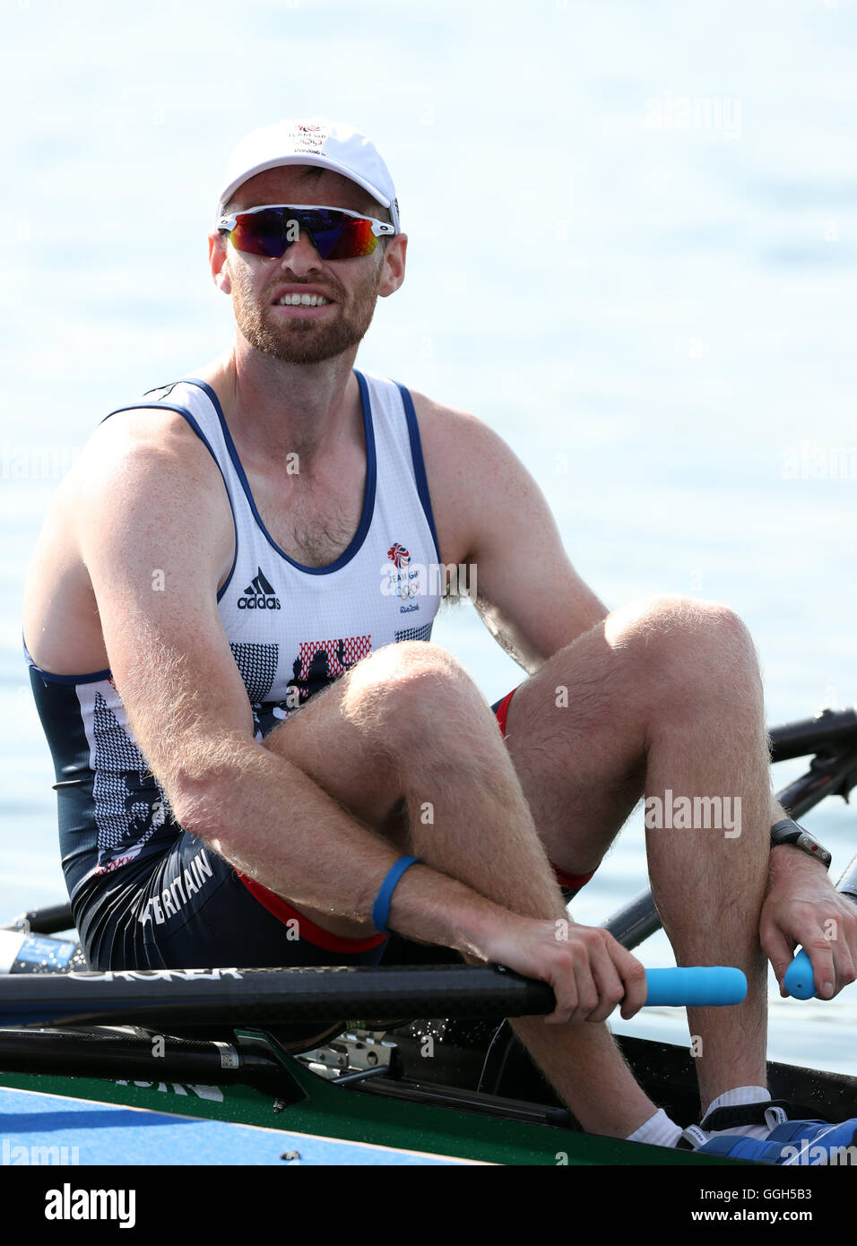 Gran Bretagna Alan Campbell durante l'uomo singolo skiff 4 di calore a Lagoa Stadiun sul primo giorno del Rio Giochi olimpici, Brasile. Foto Stock