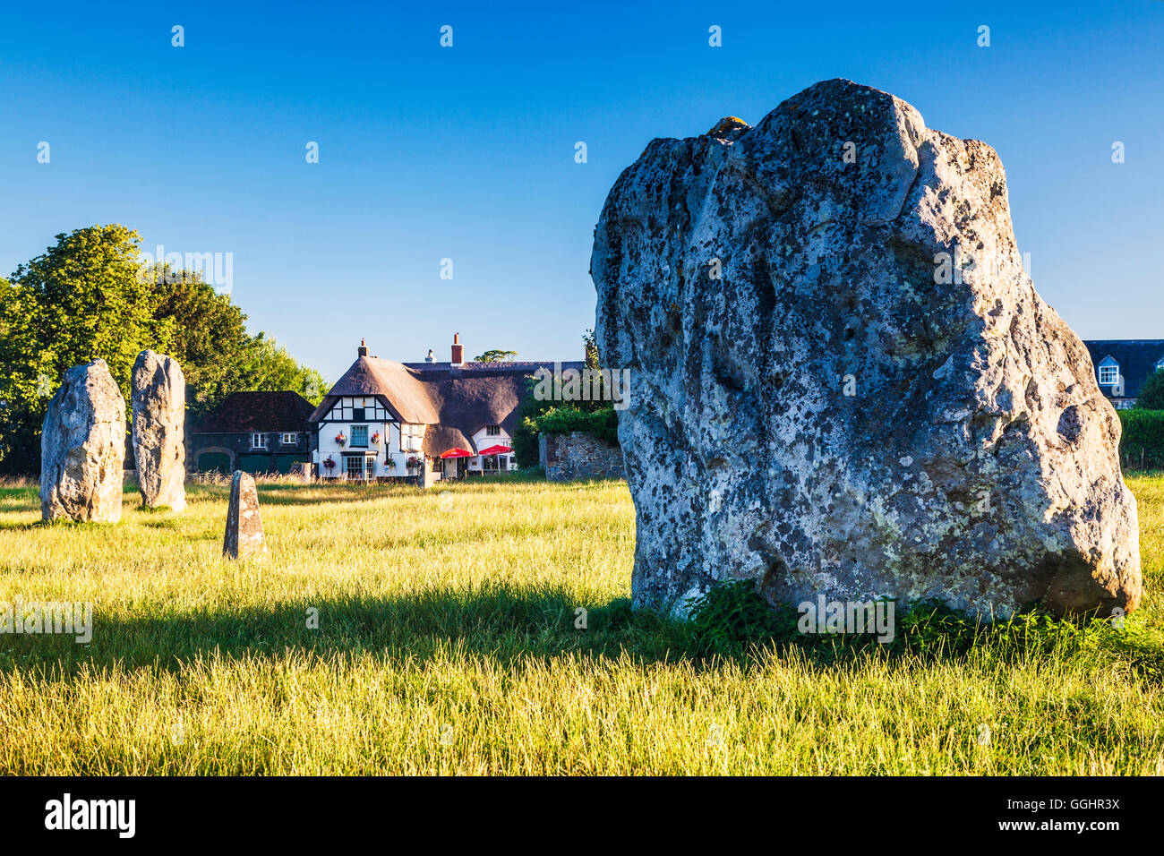 Sarsen le pietre a sunrise in Avebury, Wiltshire. Foto Stock