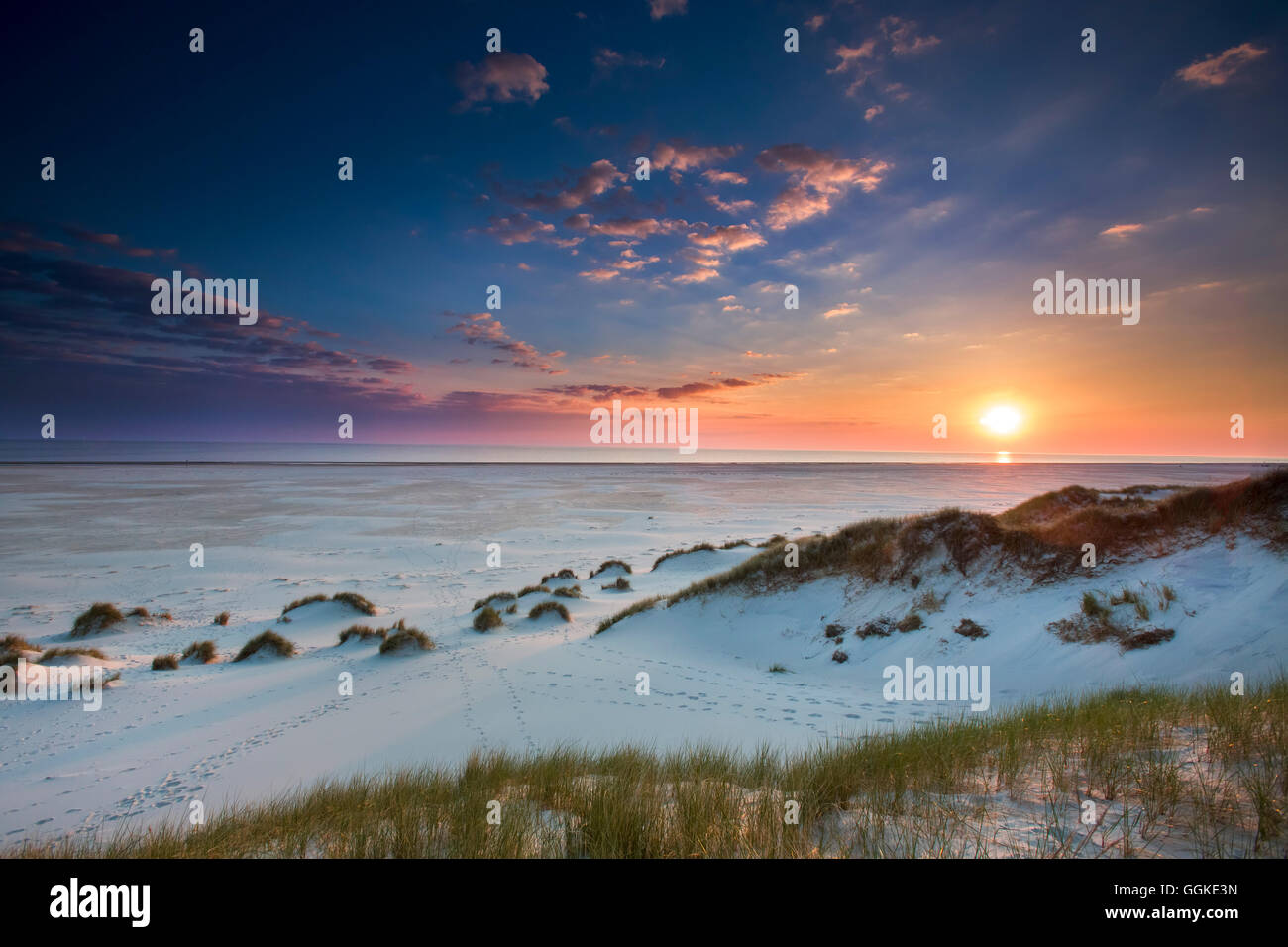 Tramonto sul mare, Amrum Island, a nord delle Isole Frisone, Schleswig-Holstein, Germania Foto Stock