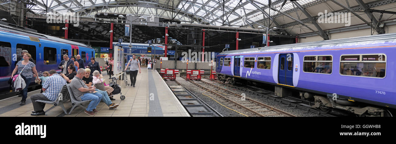 Stazione ferroviaria di Lime Street panorama, TPE treno a sinistra, a nord del convoglio ferroviario a destra della piattaforma. Liverpool, in Inghilterra, L1 1JD Foto Stock