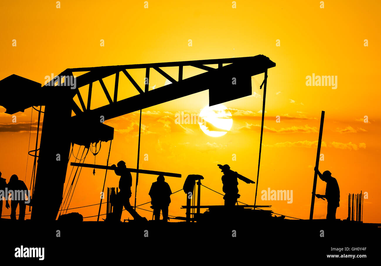 Lavoratori di tramonto Foto Stock