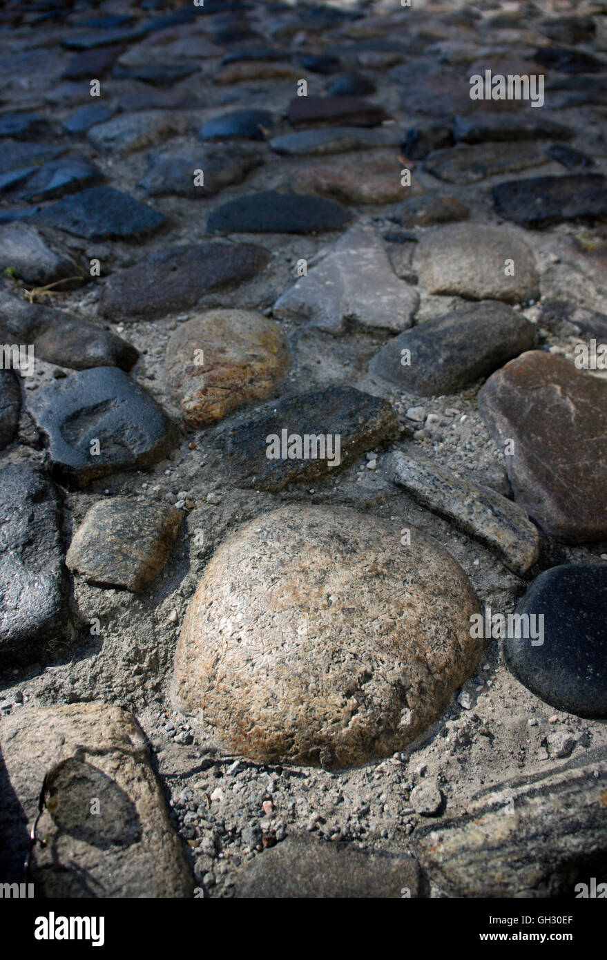 Le strade in ciottoli lungo di Savannah riverfront sono state create dal xix c. spedire la zavorra. Foto Stock