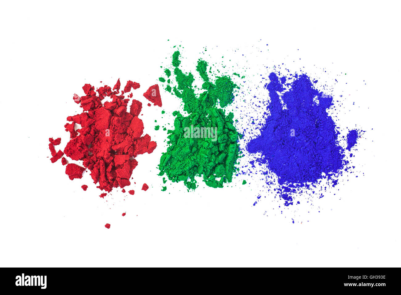 Rosso, verde e blu (i tre colori primari) polvere colorante isolato su bianco. Foto Stock