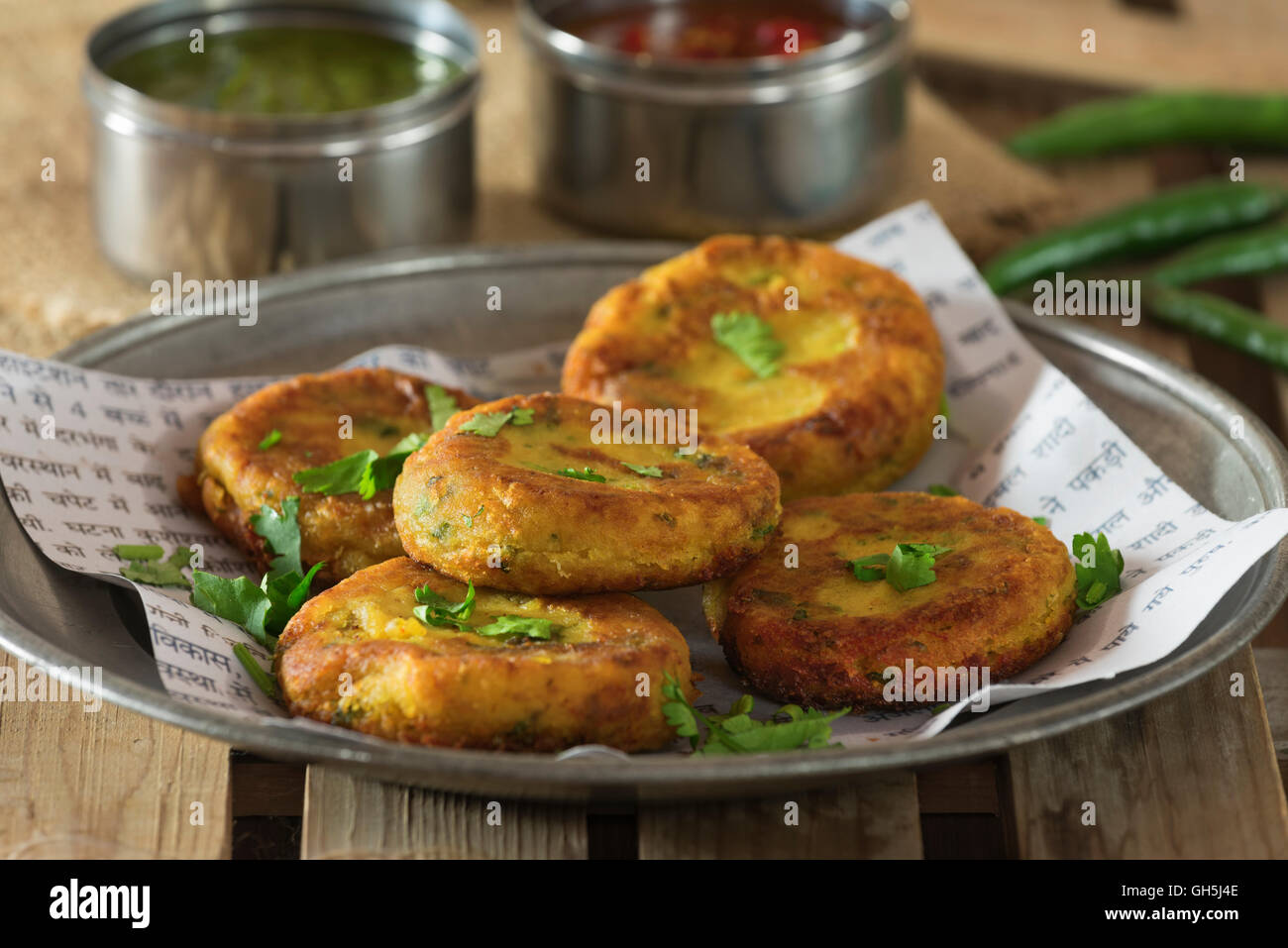 , Aloo tikki. Patate speziate cotoletta. India cibo Foto Stock