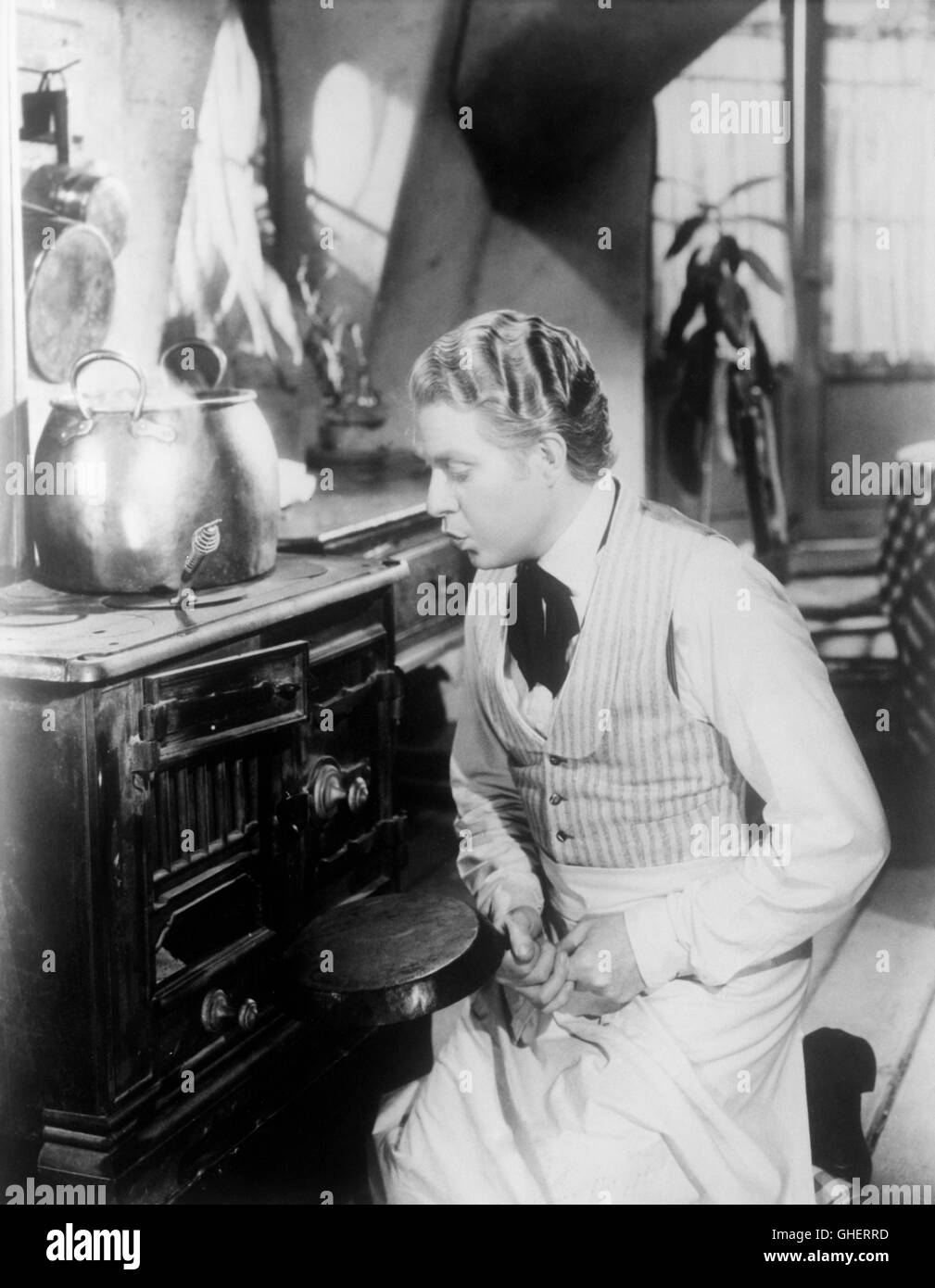 MAYTIME USA 1937 Robert Z. Leonard cucina scena: NELSON EDDY (Paolo Allison) Regie: Robert Z. Leonard Foto Stock