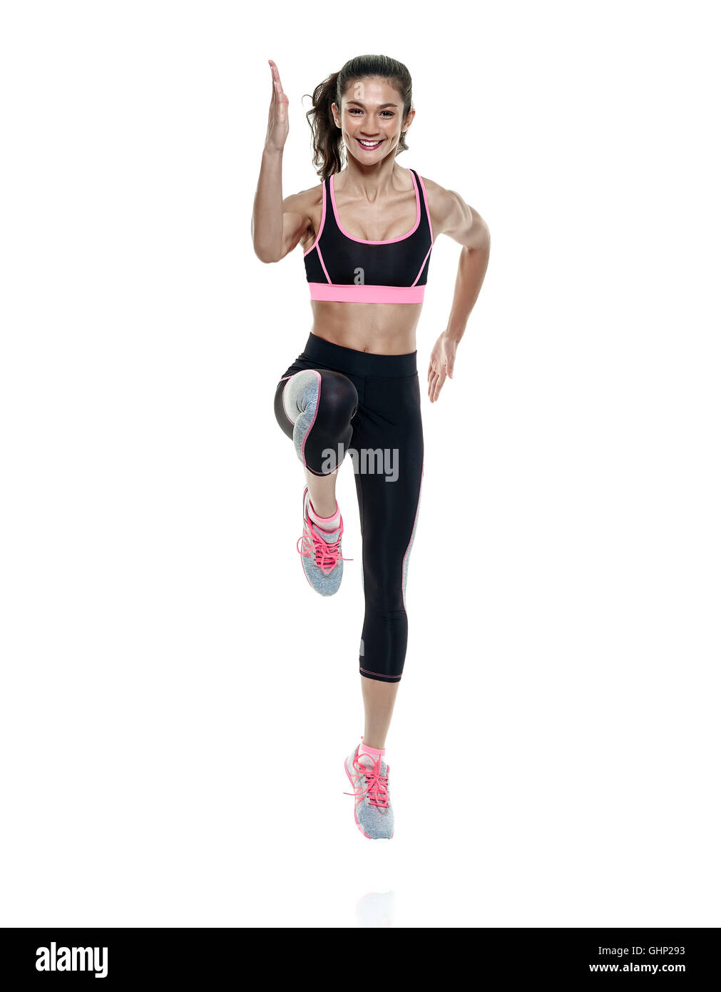 La donna gli esercizi di fitness isolato sfondo bianco Foto Stock