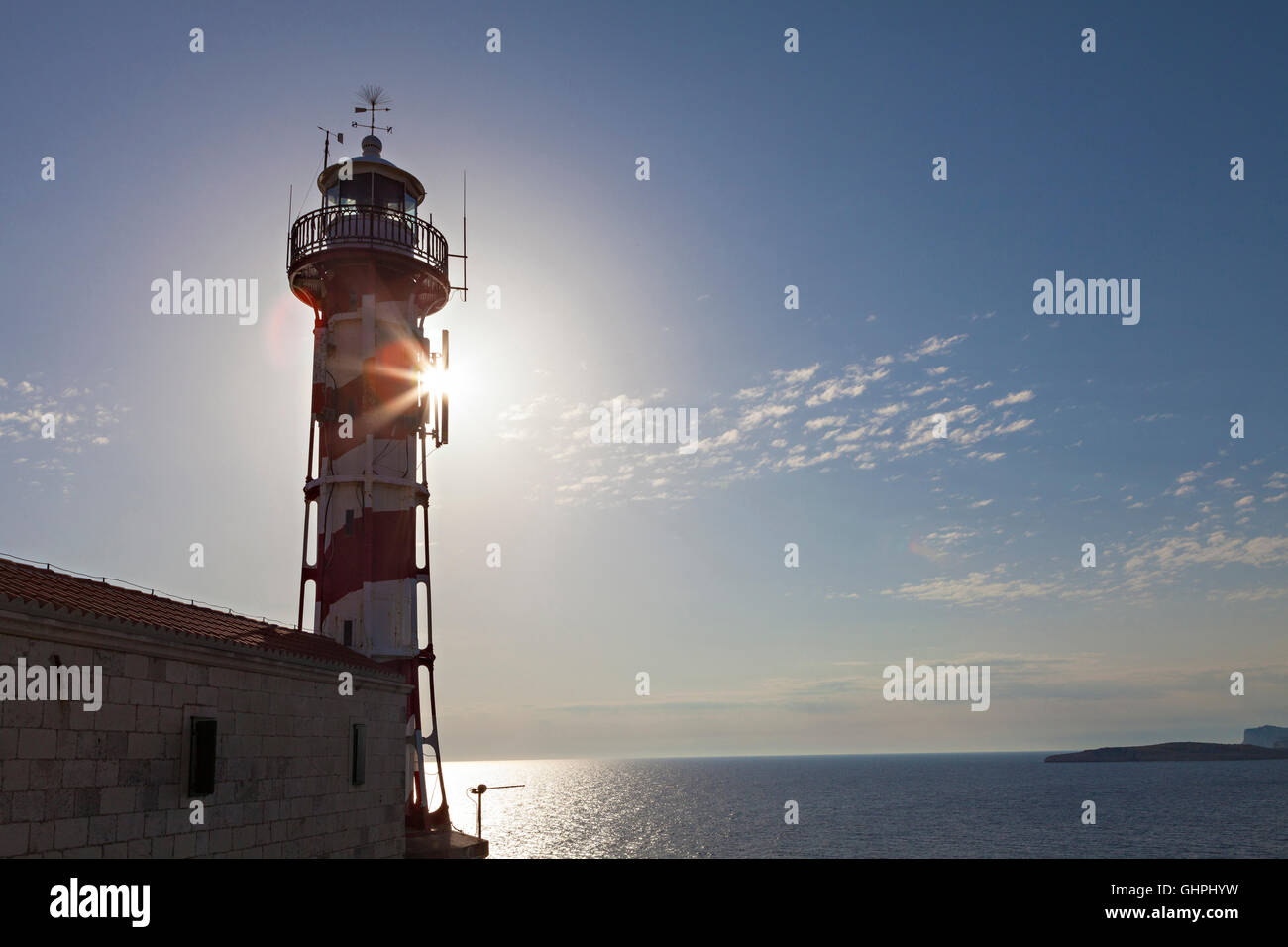 Faro al tramonto in Croazia Foto Stock