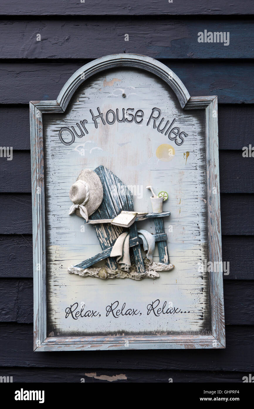 Un cartello che diceva "Le nostre regole di casa' a Amorini in Terranova e Labrador, Canada. Foto Stock