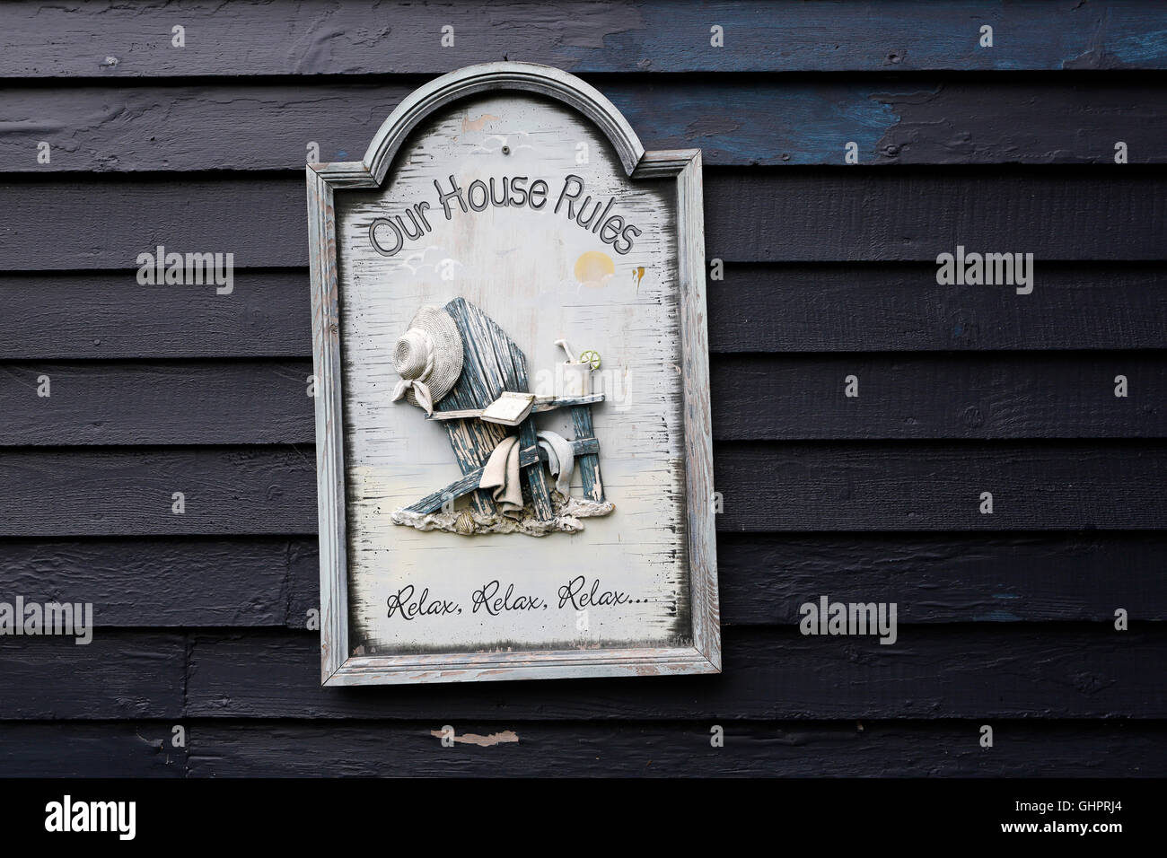 Un cartello che diceva "Le nostre regole di casa' a Amorini in Terranova e Labrador, Canada. Foto Stock