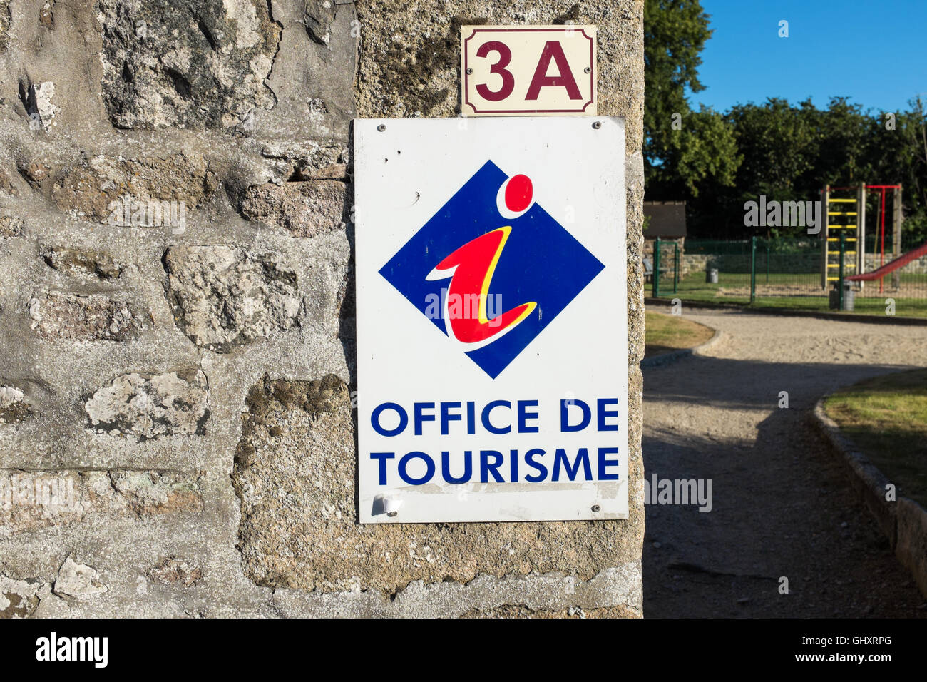 Segno sulla parete per Office de Tourisme in Francia Foto Stock