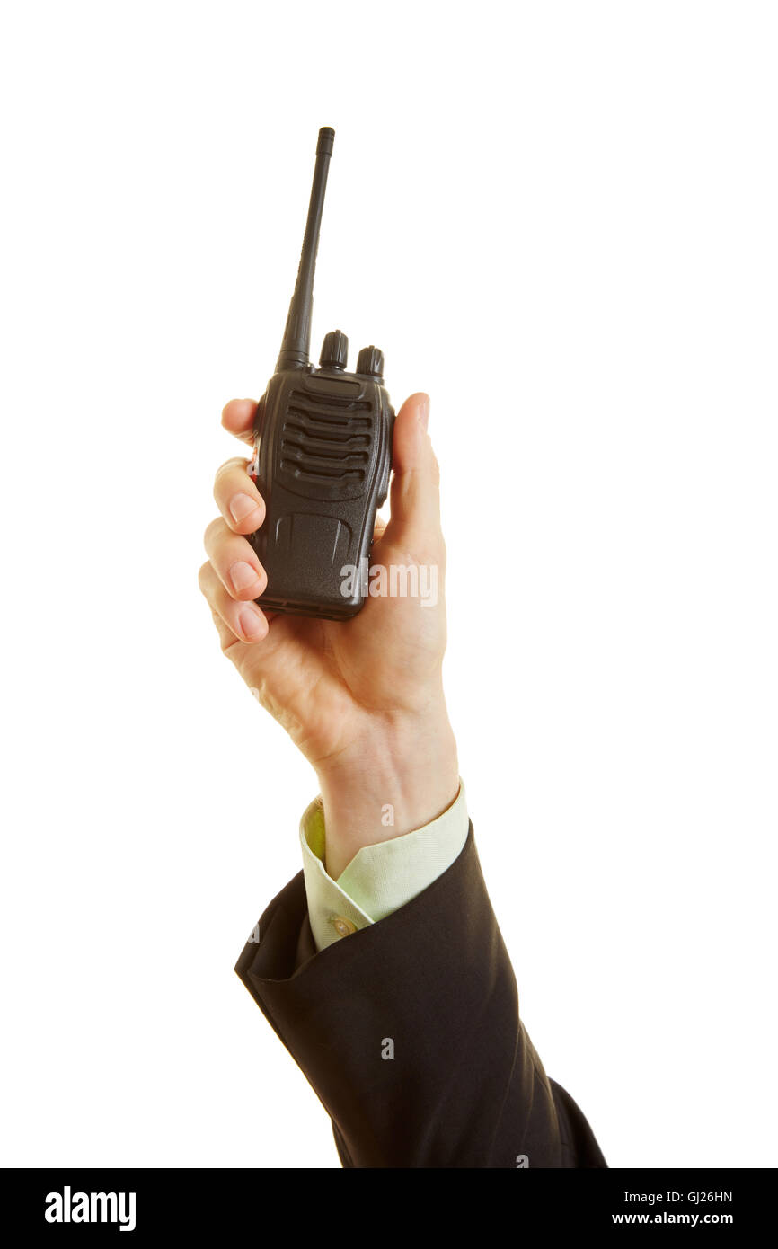 La radio in mano di un uomo come un concetto di comunicazione Foto Stock